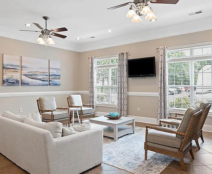 Experience comfort in this elegantly designed living room, perfect for relaxation and entertaining.