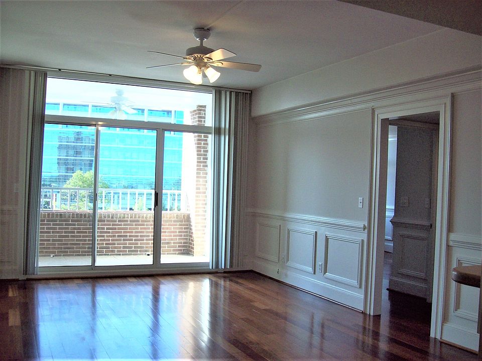 living area with good size balcony porch. door on right leads to the hallway where the bedrooms are located