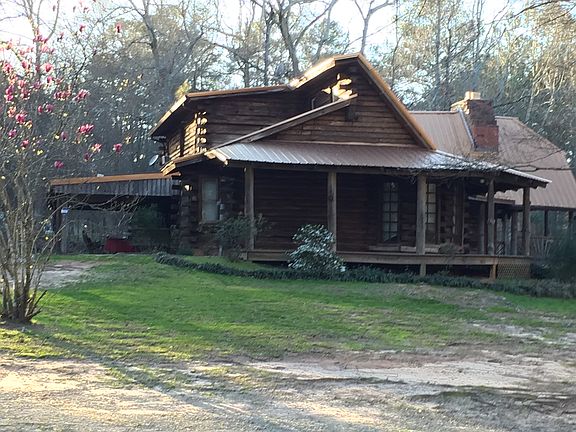 Side and back view of house