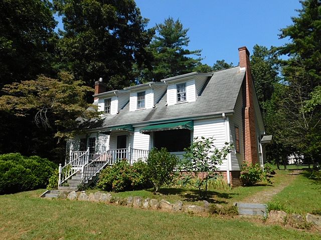 Two story traditional on private, 2 acre lot