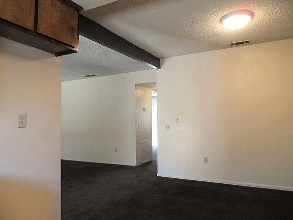 view from kitchen into living room and hallway