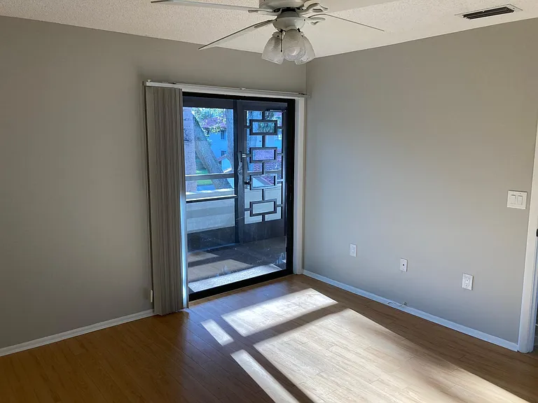 Guest bedroom access to front porch.