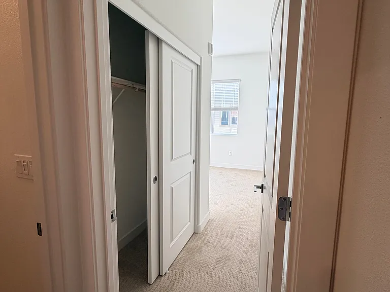 Main floor bedroom with shared bathroom