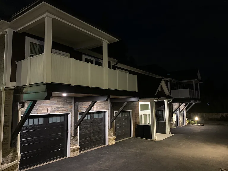 Private garages at night