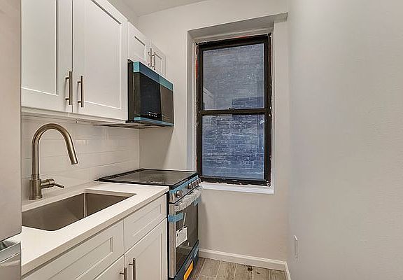 5th image of 412 W 49th St APT 4A