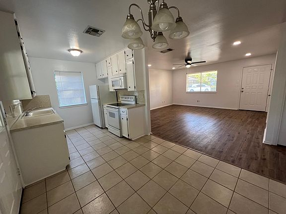 Looking Livingroom - Kitchen from Dining area
