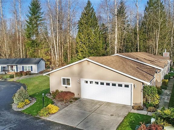 Home is beautifully landscape with a complete sprinkler system.