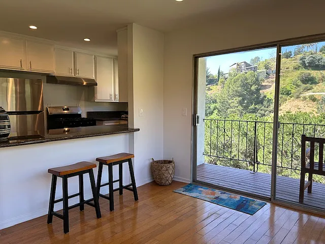View from open dining room to kitchen.