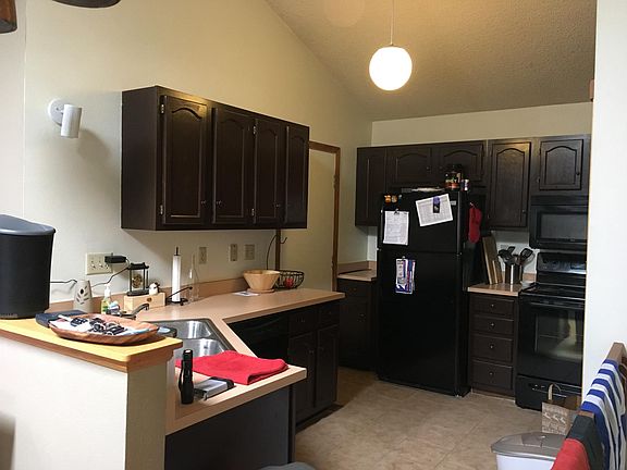 Kitchen with garage entry.