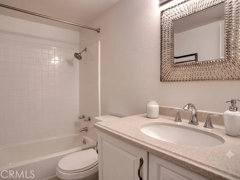 First full bathroom, near kitchen. Picture from previous listing