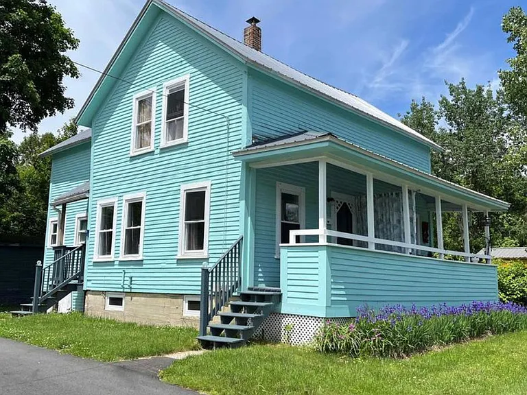 Super cute side-by side duplex with awesome front porch