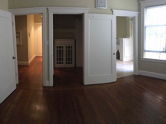 LR/DR. Doorways (L-to-R) to entryhallway, storeroom/closet, kitchen