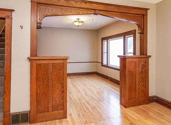 Beautiful remodel with gleaming original hardwood floors, doorframes and more.
