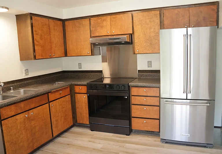 Kitchen with new range/oven and fridge