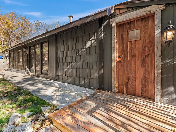 ANOTHER ENTRY WITH WOOD PATIO.