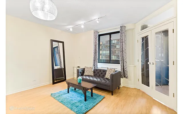 Sold by Douglas Elliman | media 18