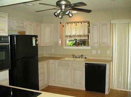 Light Colored Cabinets and Wood Laminate Flooring!