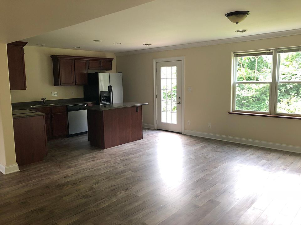 Open floor plan kitchen, dining room & living room