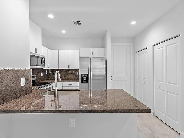 5745 SW 44th Ct #202 — Photo 11