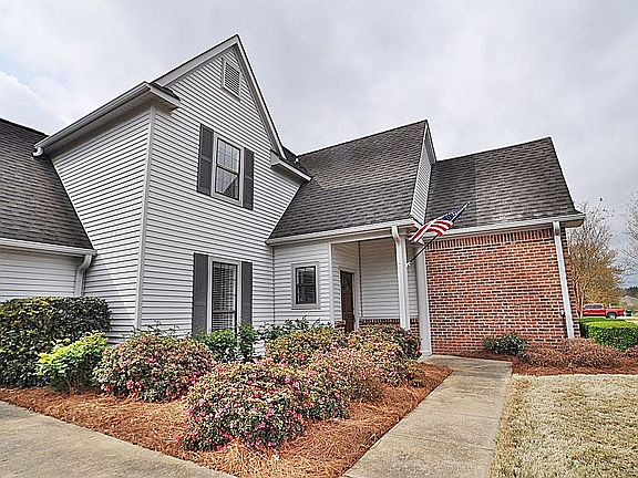 FRONT EAST SIDE FROM DRIVE