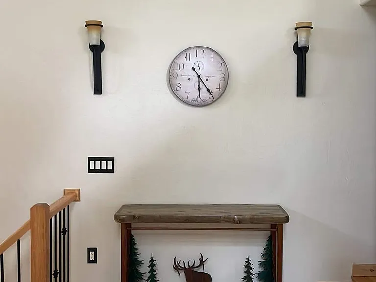Top of stairs, part of the living room