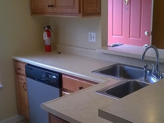 Kitchen with dishwasher, Bar/counter top eating area with stools
