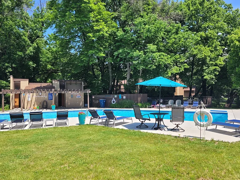 Large outdoor pool with plenty of lounge chairs