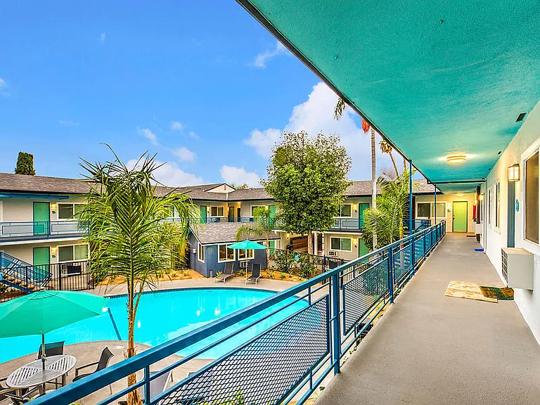 The Island Apartments view of pool from second floor walkway