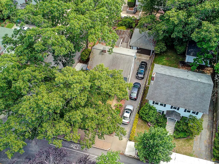 Driveway fits up to 3 vehicles for off street parking.
