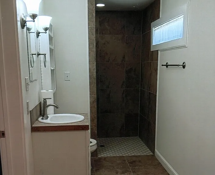 Down stair bath looking from bedroom.