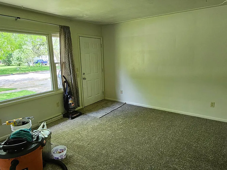 Looking to Main entrance from hall (ShopVac Not Included) :)