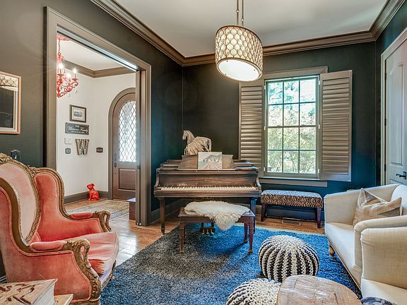 music room with baby grand piano