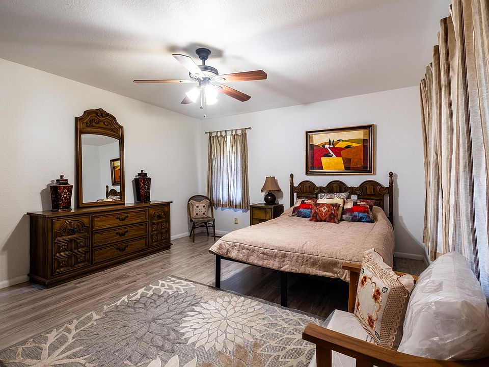 Master's bedroom with a full bathroom