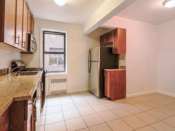 4th image of 9830 67th Ave APT 3C