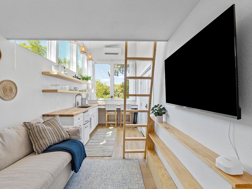 Comfortable West Elm with pillows to get cozy during movie night