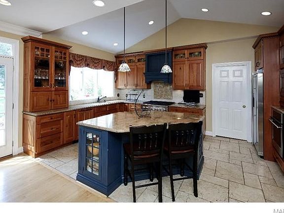 View from the breakfast area into the kitchen. The French door leads out to the patio.