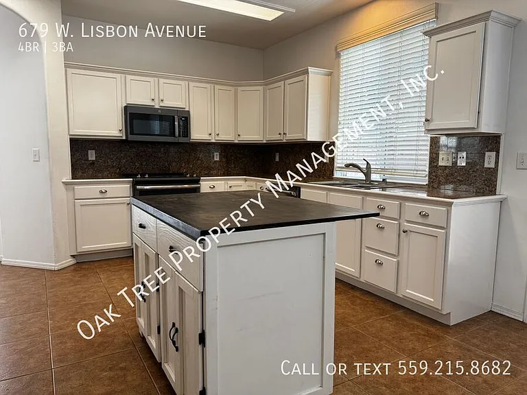 679 W Lisbon Ln — Photo 2