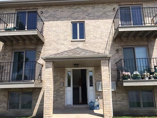Front of Building. Unit on Middle Leftside