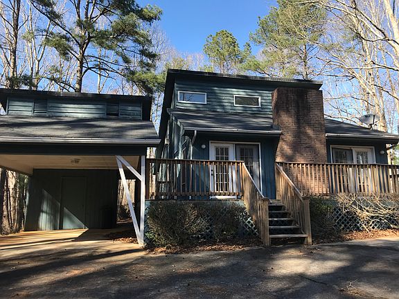 FRONT ENTRANCE W/CARPORT