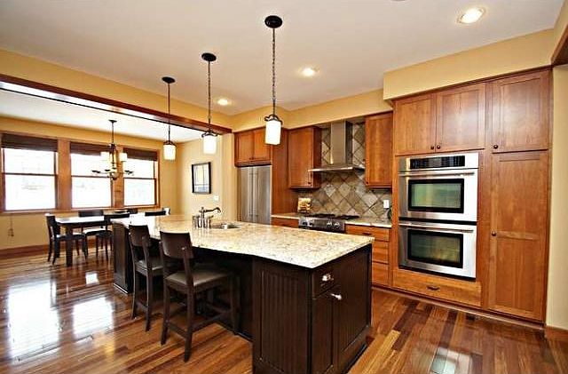 Who wouldn't want to come home to this stunning gourmet kitchen with all the bells and whistles. There is a butlers pantry, 1/2 bath and mudroom off the kitchen that leads to the garage.
