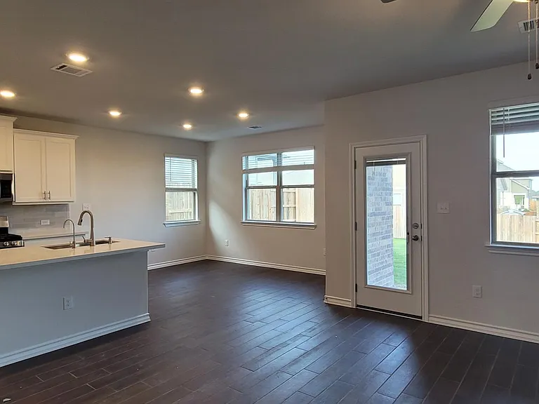 Another kitchen and dining