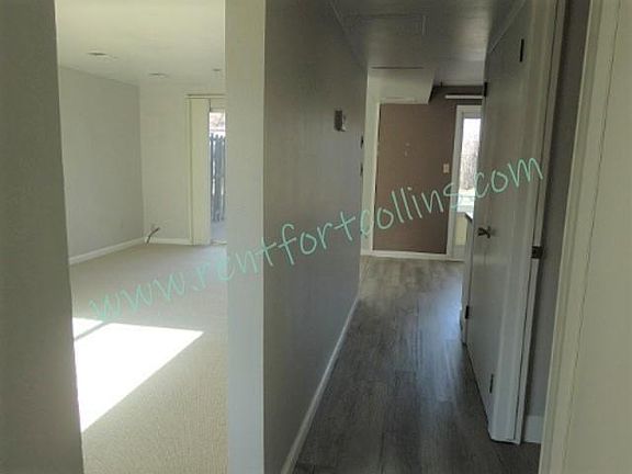 Lower level: kitchen, living room, bathroom/laundry room, access to backyard