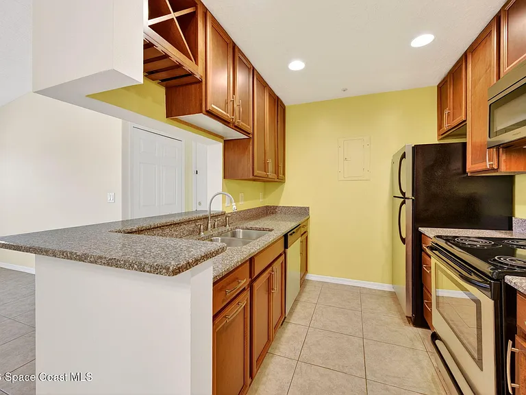 7667 N Wickham Rd #219 — Photo 4
