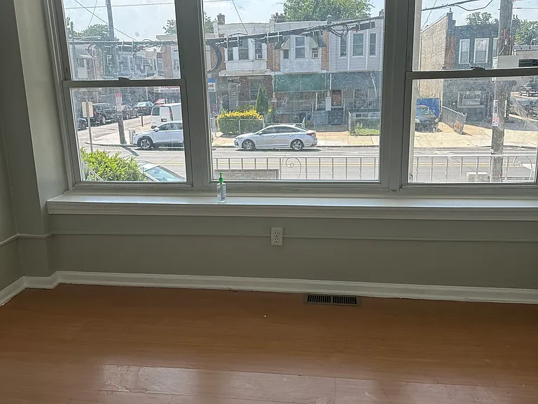 Sunlit & Spacious Main Bedroom