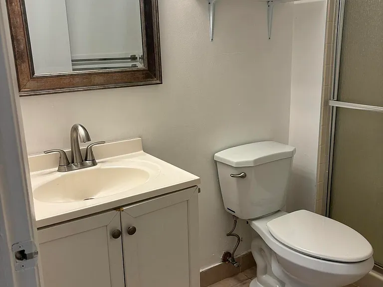 9033 Wiles Rd #102 — Photo 9