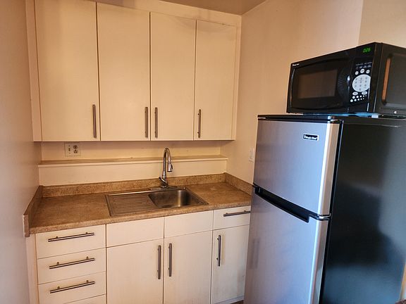 Kitchenette. Please note we provide a hot plate, microwave, toaster oven, and small refrigerator/freezer.