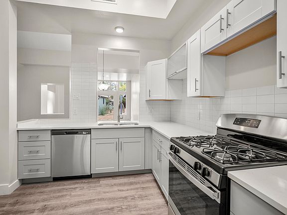 Open view from the kitchen to the dining and living room.