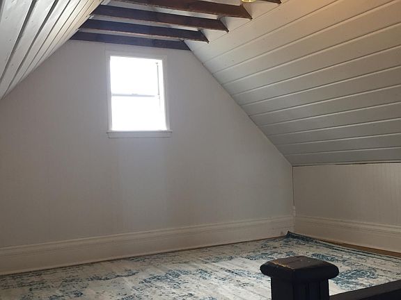 A view of upstairs bedroom #2 from the stairs.