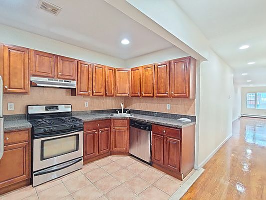 1st image of 716 E 96th St #2A