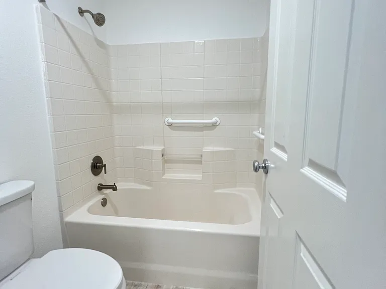 Full bathroom with separate vanity. Jack and Jill for bedrooms 1 and 2.